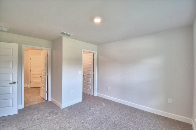 unfurnished bedroom with carpet