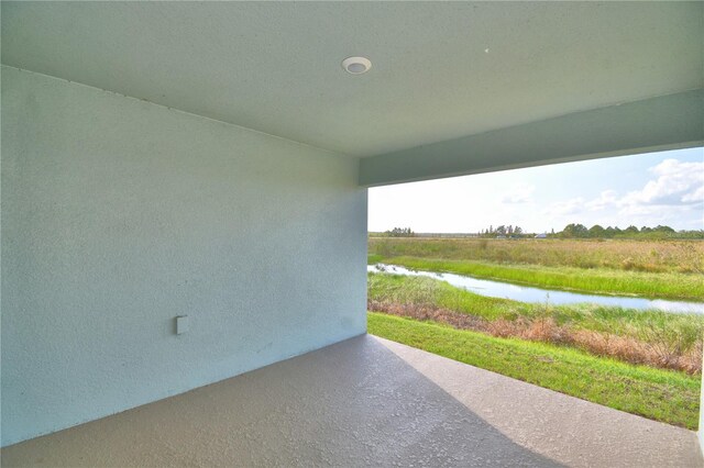 view of patio with a rural view