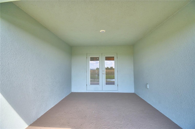 view of exterior entry with french doors