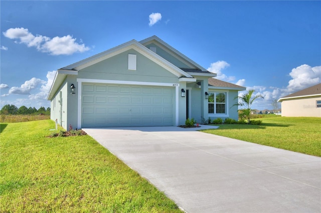 view of front of home featuring a front yard and a garage