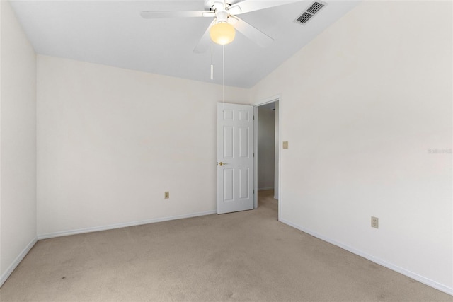 unfurnished room featuring ceiling fan and light carpet