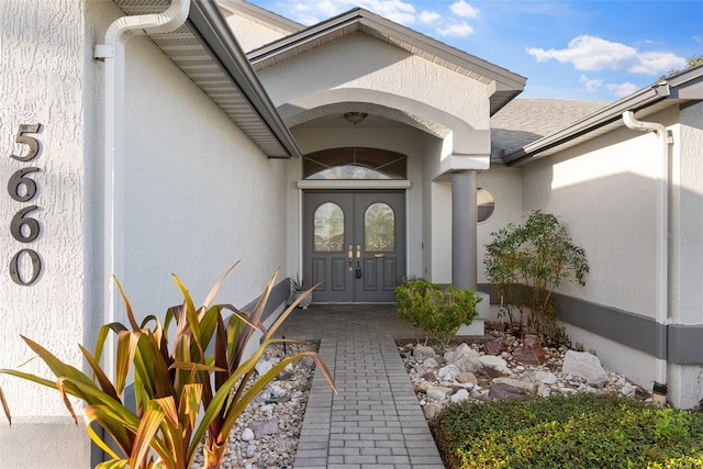 entrance to property featuring french doors