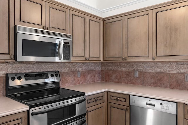 kitchen featuring decorative backsplash and appliances with stainless steel finishes