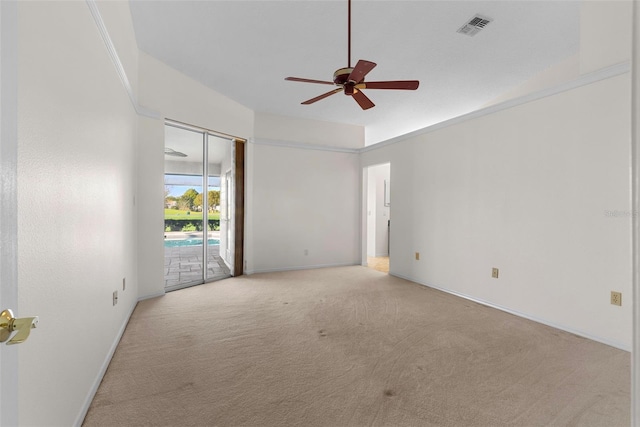 unfurnished room featuring light colored carpet and ceiling fan