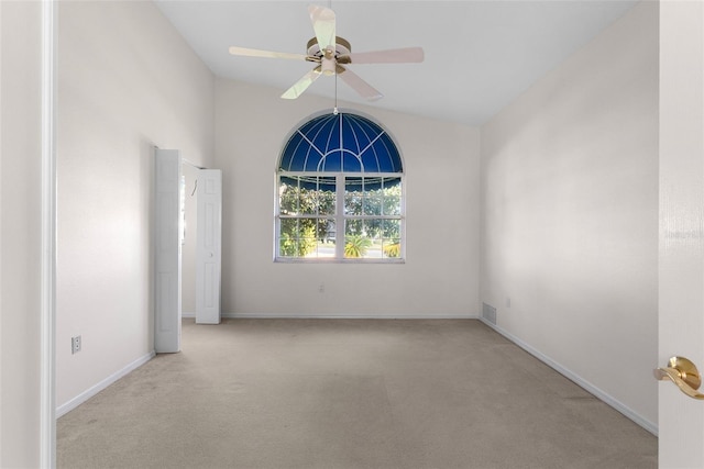 carpeted empty room with ceiling fan