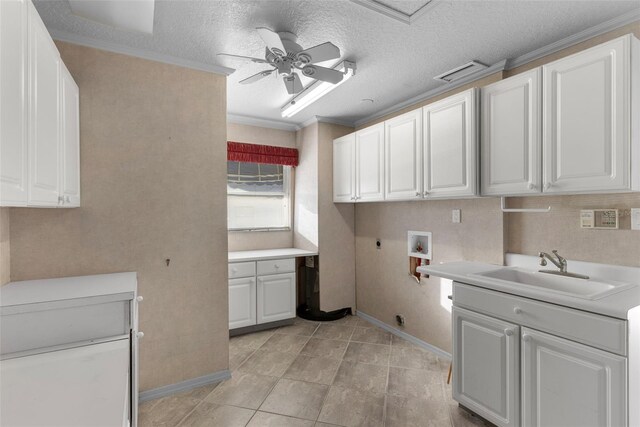 laundry room featuring sink, cabinets, hookup for a washing machine, electric dryer hookup, and ceiling fan