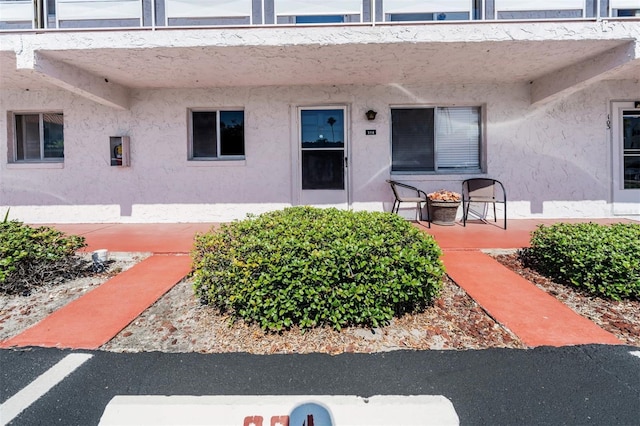 doorway to property featuring a patio