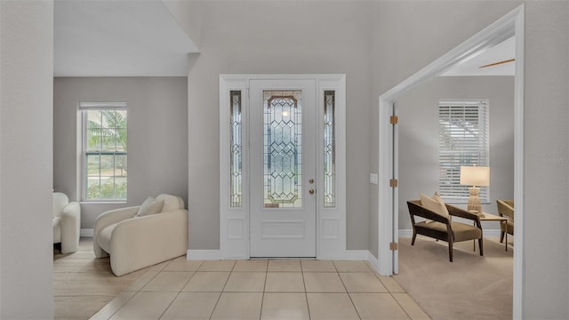 foyer entrance featuring light tile patterned floors