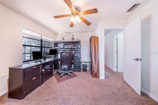 office featuring light colored carpet and ceiling fan