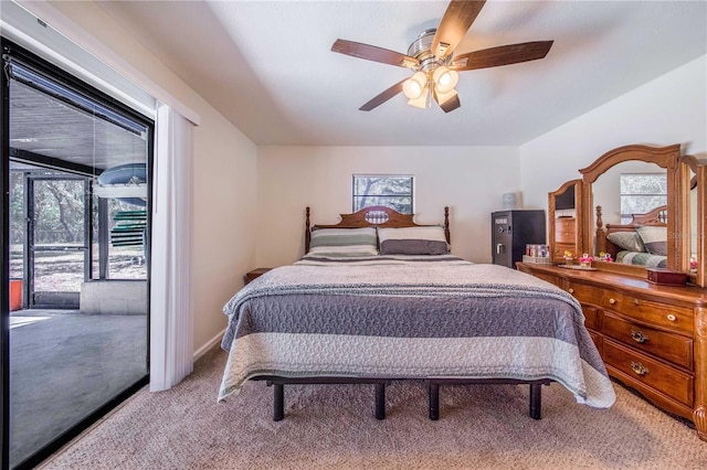 bedroom with ceiling fan and light colored carpet