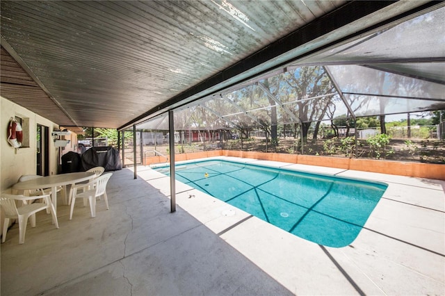 view of pool featuring a lanai and a patio