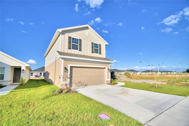 view of front of house with a garage and a front lawn