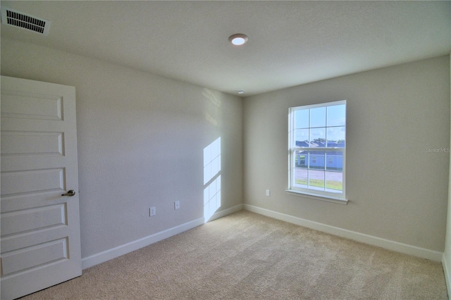 empty room with light carpet