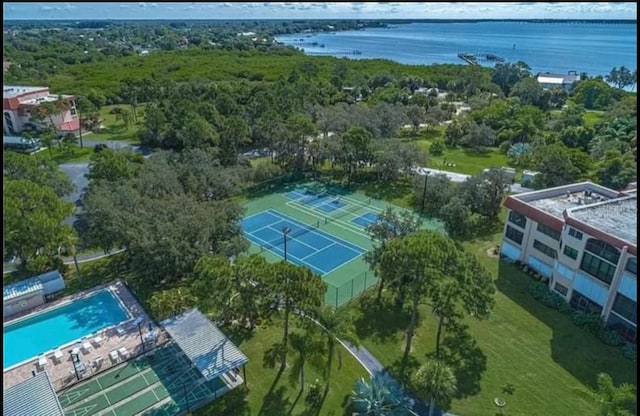 birds eye view of property featuring a water view