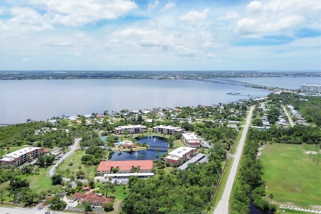 birds eye view of property featuring a water view