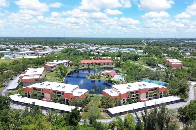 drone / aerial view with a water view