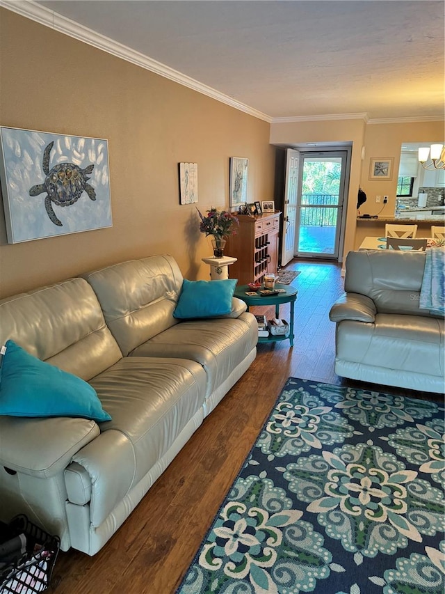 living room with hardwood / wood-style floors and ornamental molding