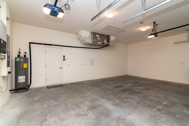 garage featuring water heater and a garage door opener