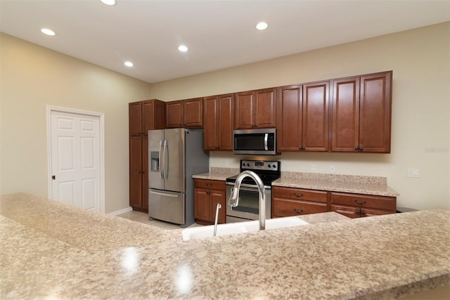 kitchen featuring appliances with stainless steel finishes and sink