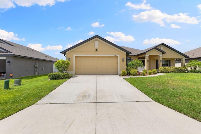 view of front facade featuring a front yard and a garage