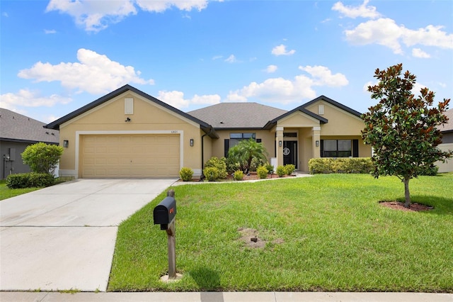 ranch-style house with a garage and a front yard