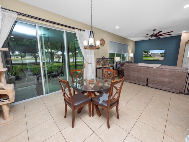 dining area with a ceiling fan, recessed lighting, and light tile patterned floors