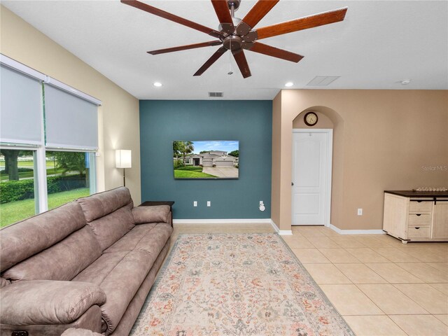 living area with recessed lighting, visible vents, ceiling fan, and light tile patterned flooring