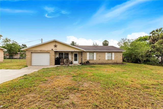 single story home with a garage and a front yard