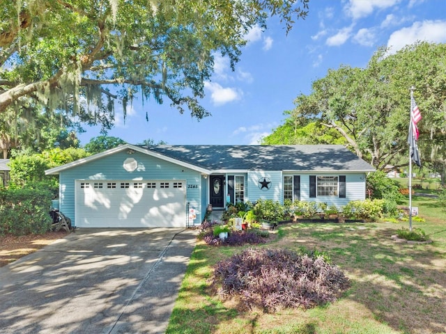 ranch-style house featuring a garage