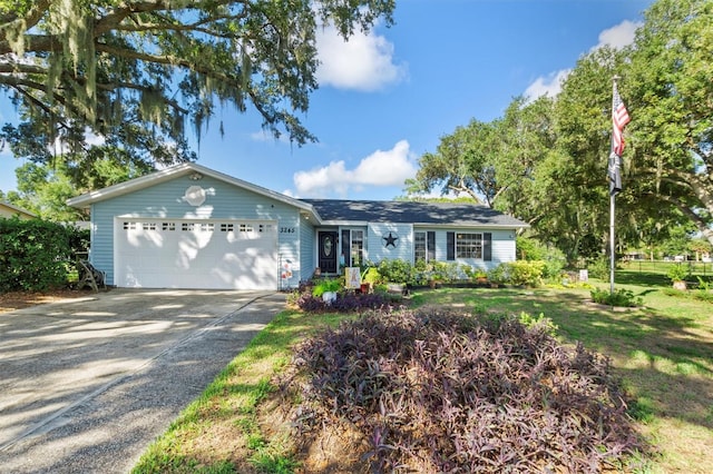 single story home featuring a garage