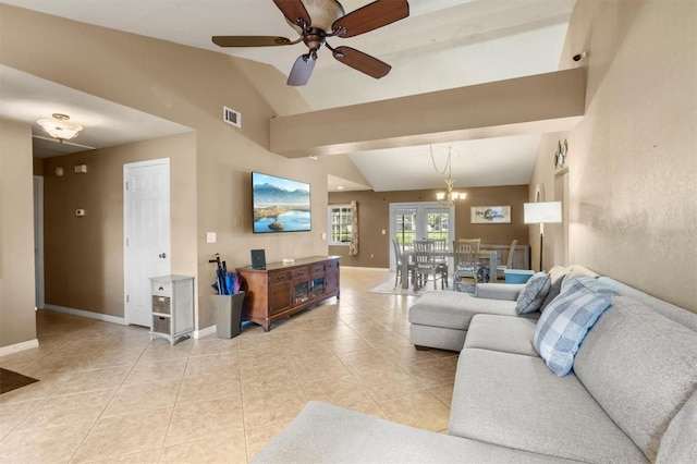 tiled living room with lofted ceiling with beams and ceiling fan with notable chandelier