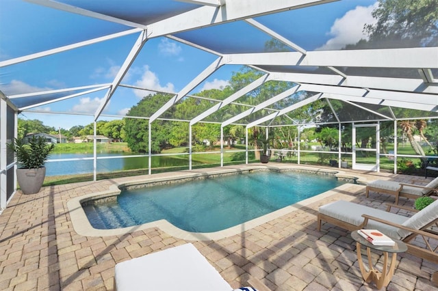 view of swimming pool with a lanai and a patio area