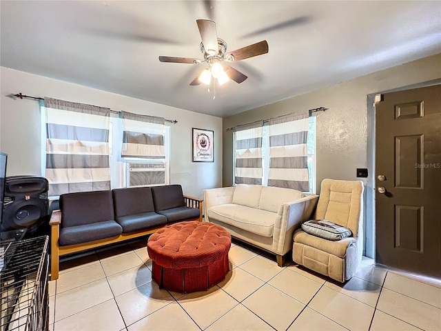 living room with cooling unit, ceiling fan, and light tile patterned floors