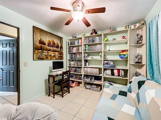 home office featuring ceiling fan and light tile patterned floors