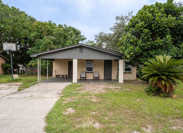 view of front of property with a carport