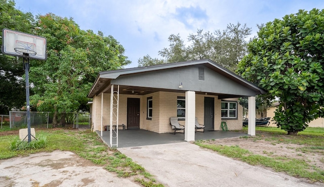 bungalow featuring a carport