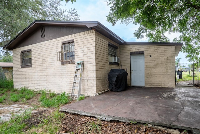 back of house featuring a patio