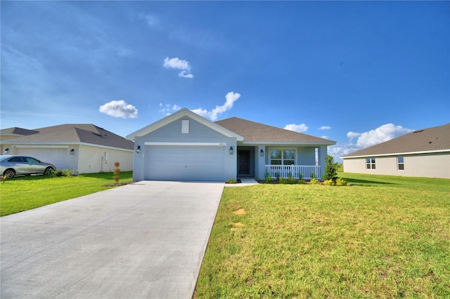 single story home with covered porch, a front yard, and a garage