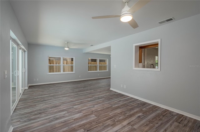 unfurnished room with hardwood / wood-style flooring and ceiling fan