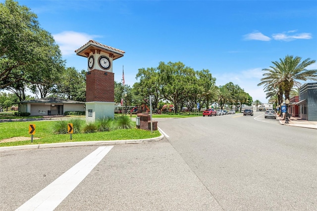 view of street featuring curbs