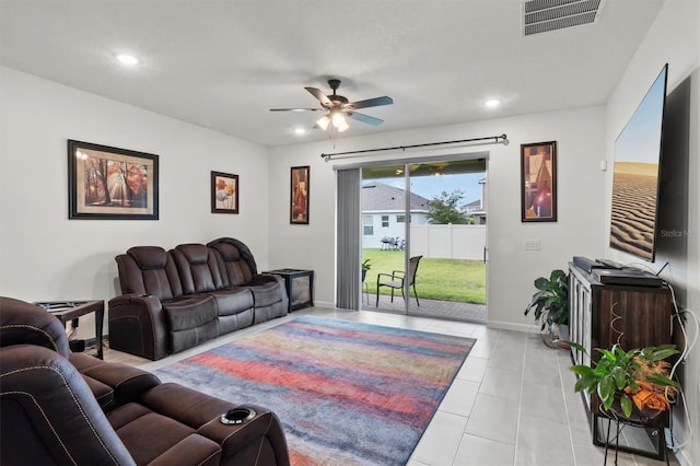 living room featuring ceiling fan and light tile patterned floors