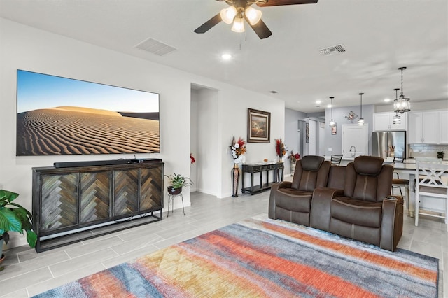 living room with ceiling fan