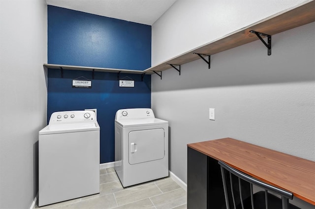 laundry room with washer and dryer