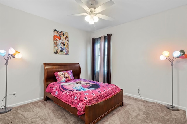 bedroom with light carpet and ceiling fan