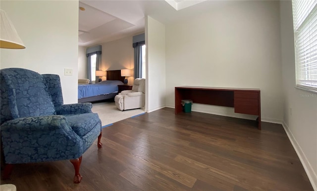 bedroom featuring dark hardwood / wood-style flooring