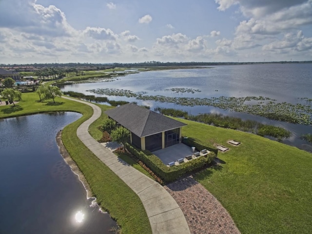 drone / aerial view with a water view