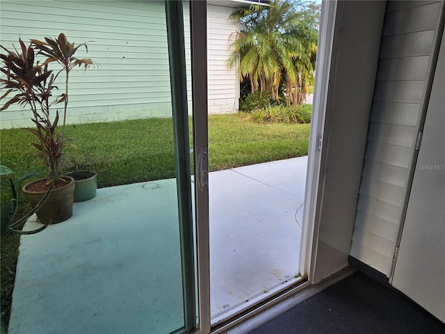 doorway to outside featuring wooden walls