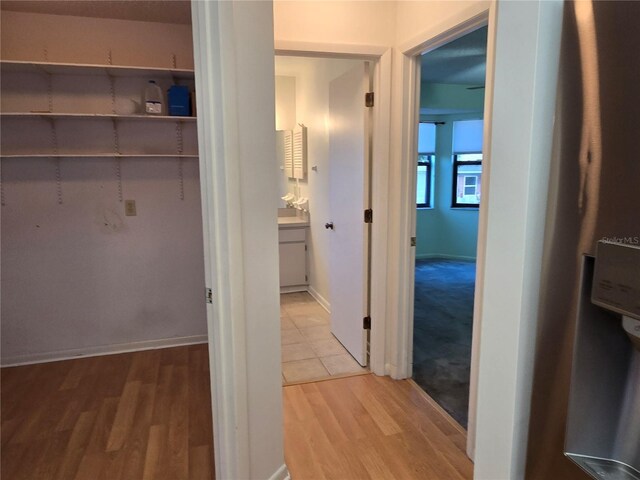 3130 Prairie Dunes Cir W, Lakeland, FL 33810 - corridor featuring wood finished floors