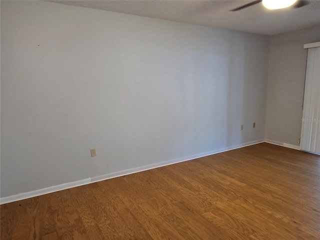 empty room featuring wood-type flooring