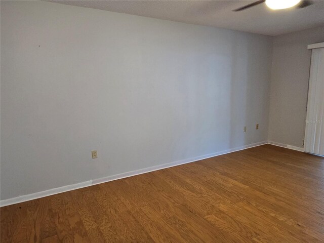 3130 Prairie Dunes Cir W, Lakeland, FL 33810 - unfurnished room with wood finished floors, baseboards, and ceiling fan